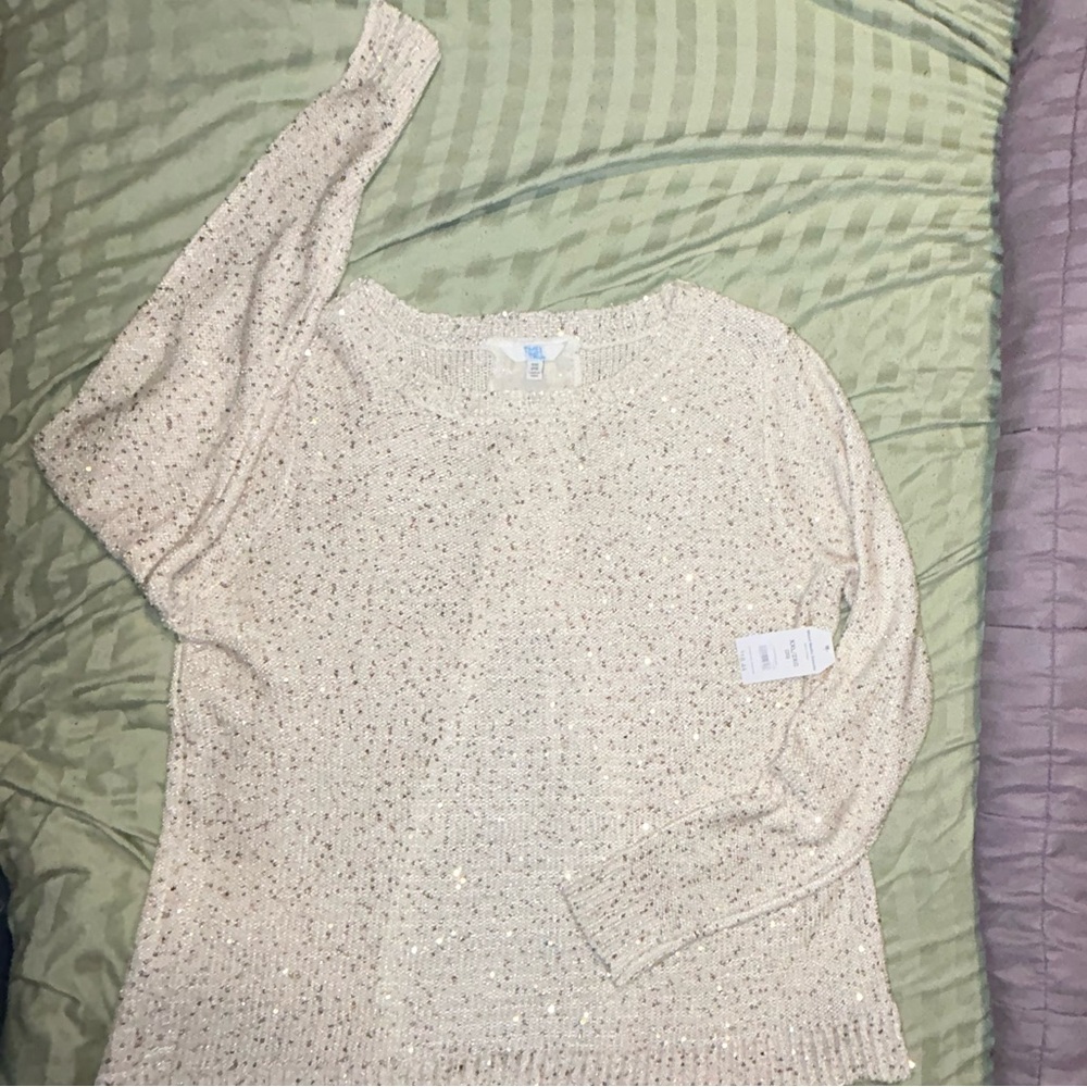 A line off white sweater with gold sequins and lace up back. NWT